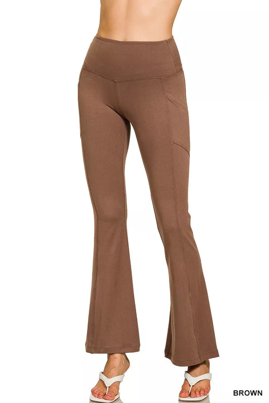 Brown high-rise microfiber flare pants with side pockets shown on model.