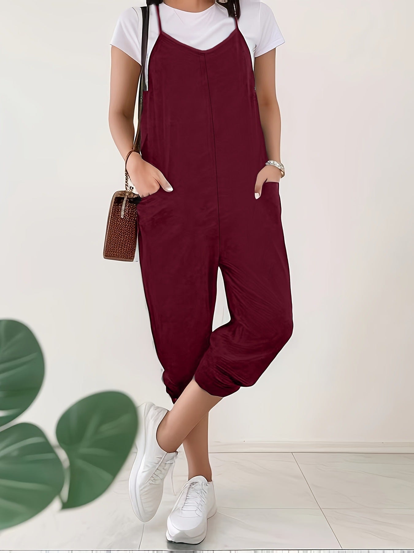 Relaxed sleeveless pocket jumpsuit with loose fit