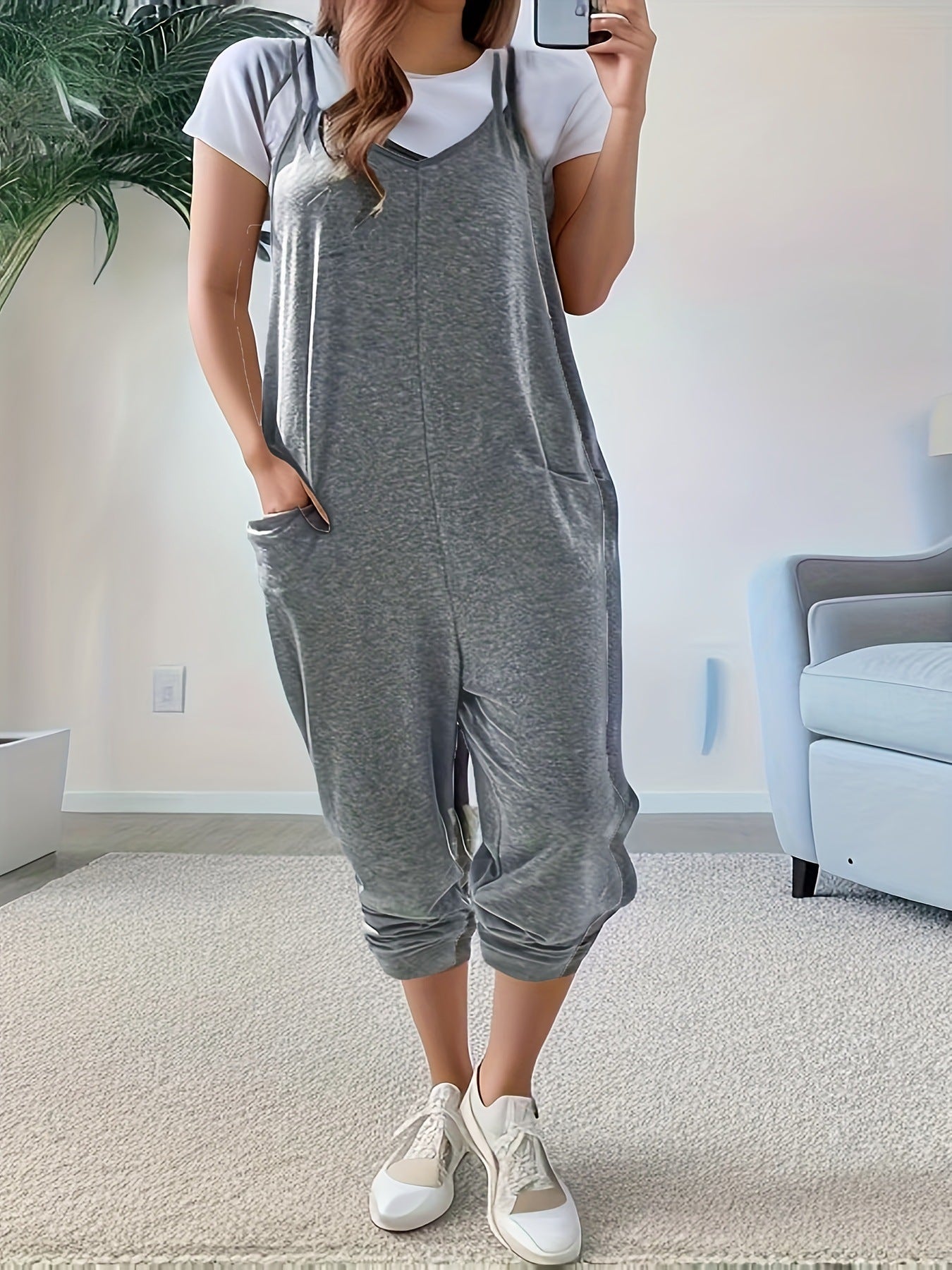Relaxed sleeveless pocket jumpsuit with loose fit