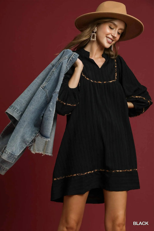 Black textured babydoll dress with leopard print trim – Eclipse style from A Whimsical Affair.