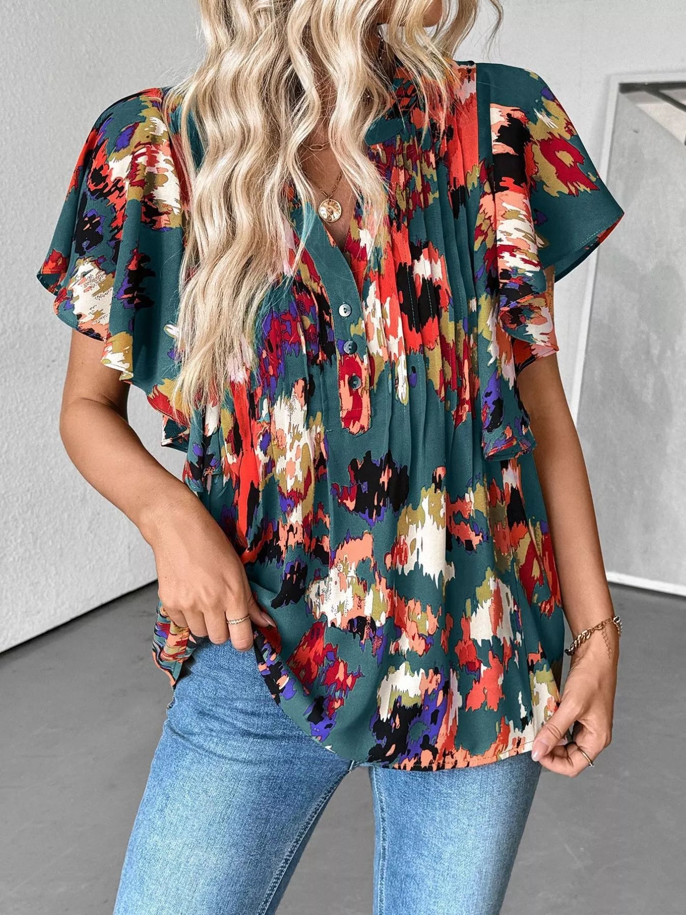 Multicolor abstract blouse with flutter sleeves and buttoned ruched neckline