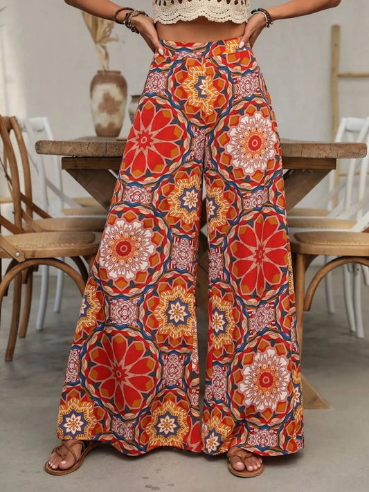 Orange-red printed wide-leg pants in lightweight polyester – Ember Glow style from A Whimsical Affair.