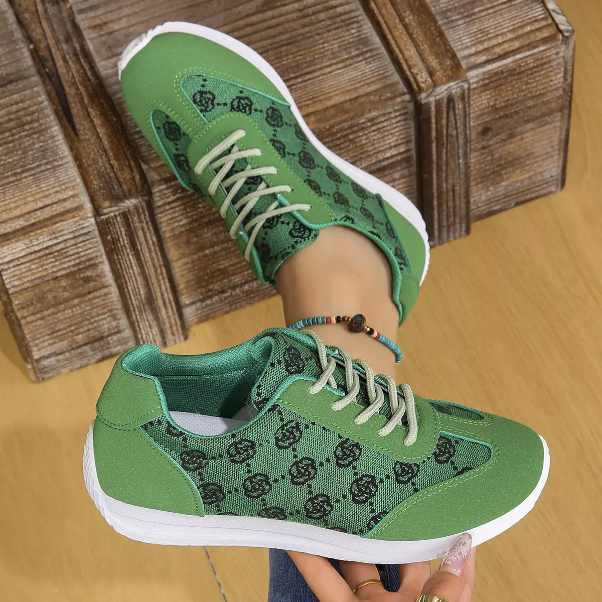 Green patterned lace-up comfort sneakers with flat sole