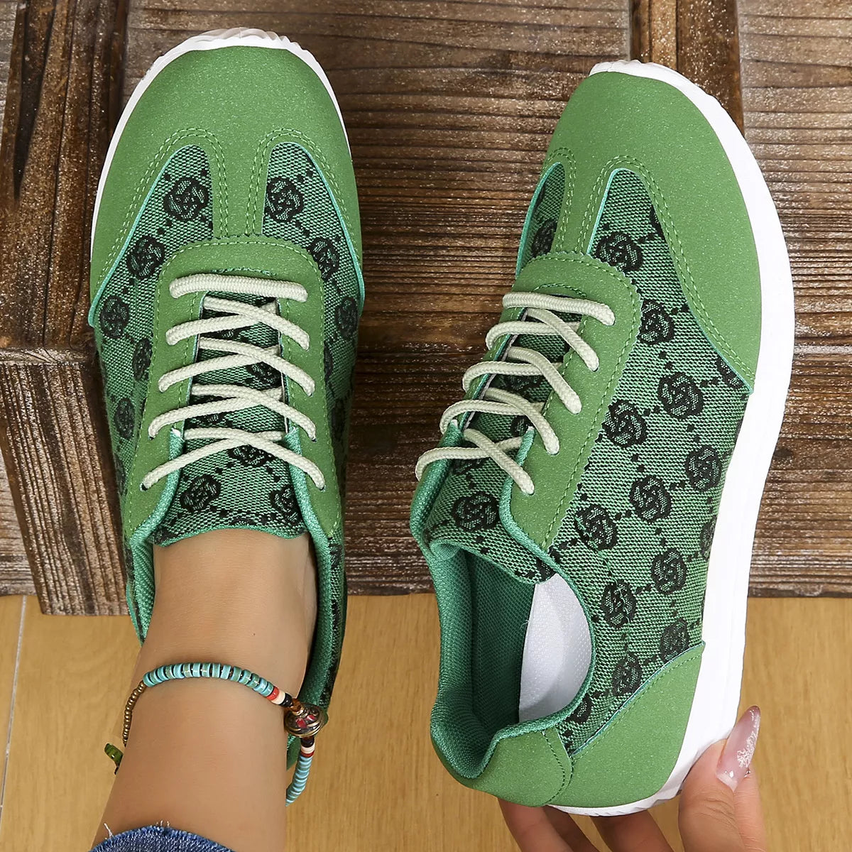 Green patterned lace-up comfort sneakers with flat sole