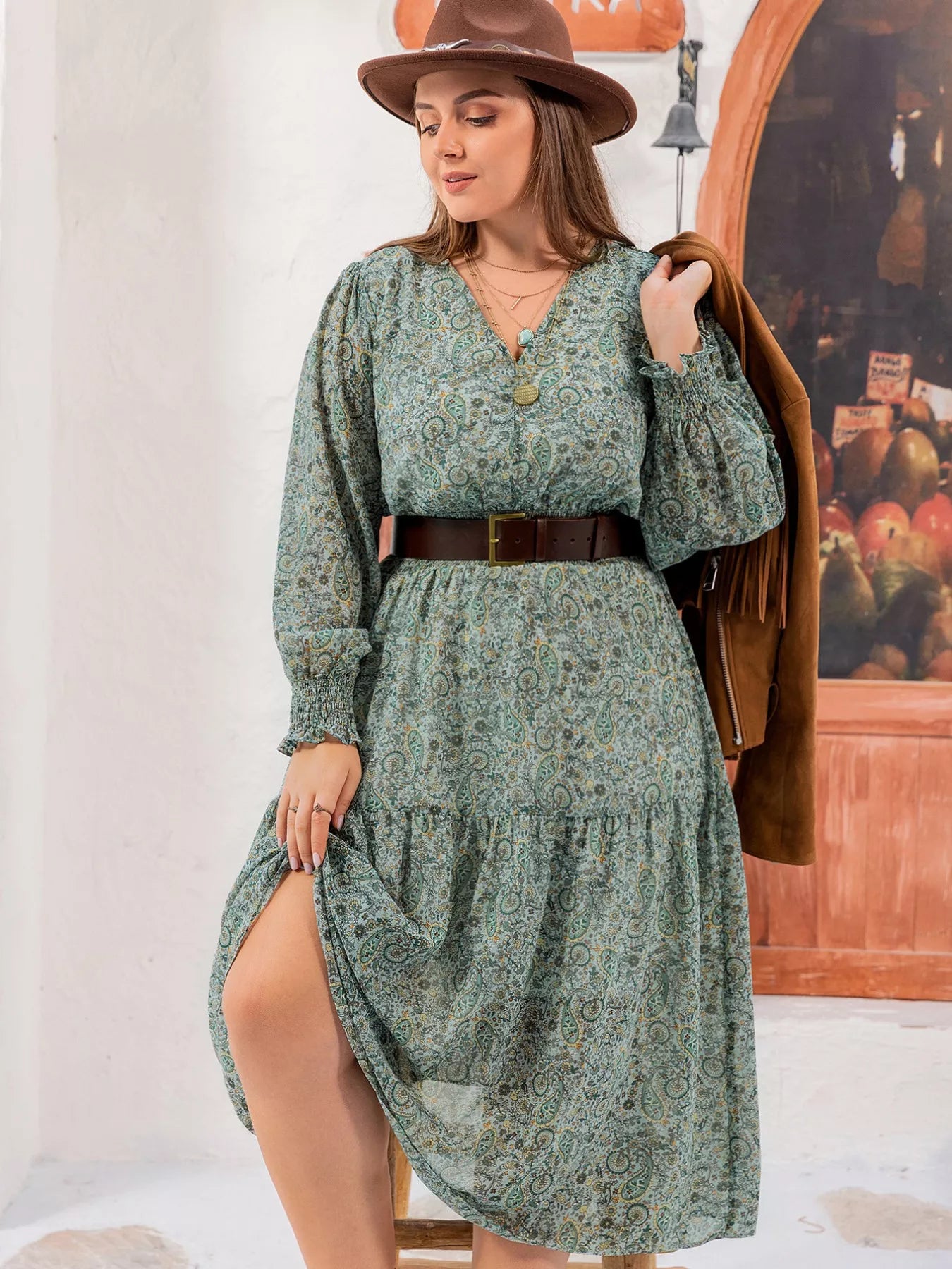Plus size green paisley print midi dress with smocked waist and long sleeves