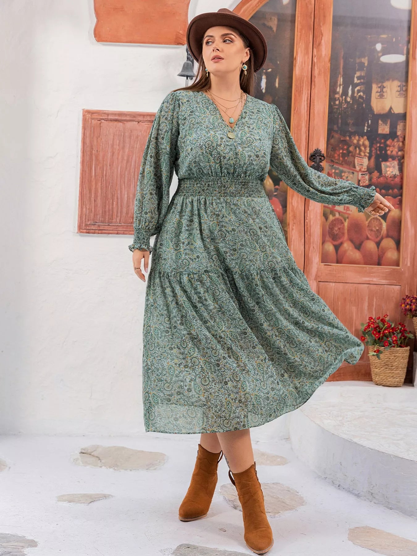 Plus size green paisley print midi dress with smocked waist and long sleeves