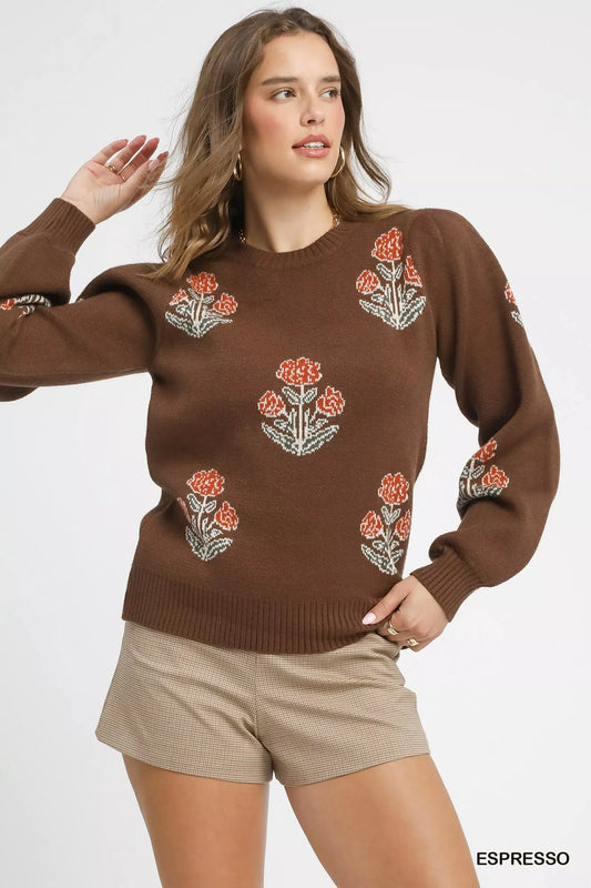 Woman wearing an espresso brown puff sleeve floral knit sweater — cozy feminine winter outfit from A Whimsical Affair.
