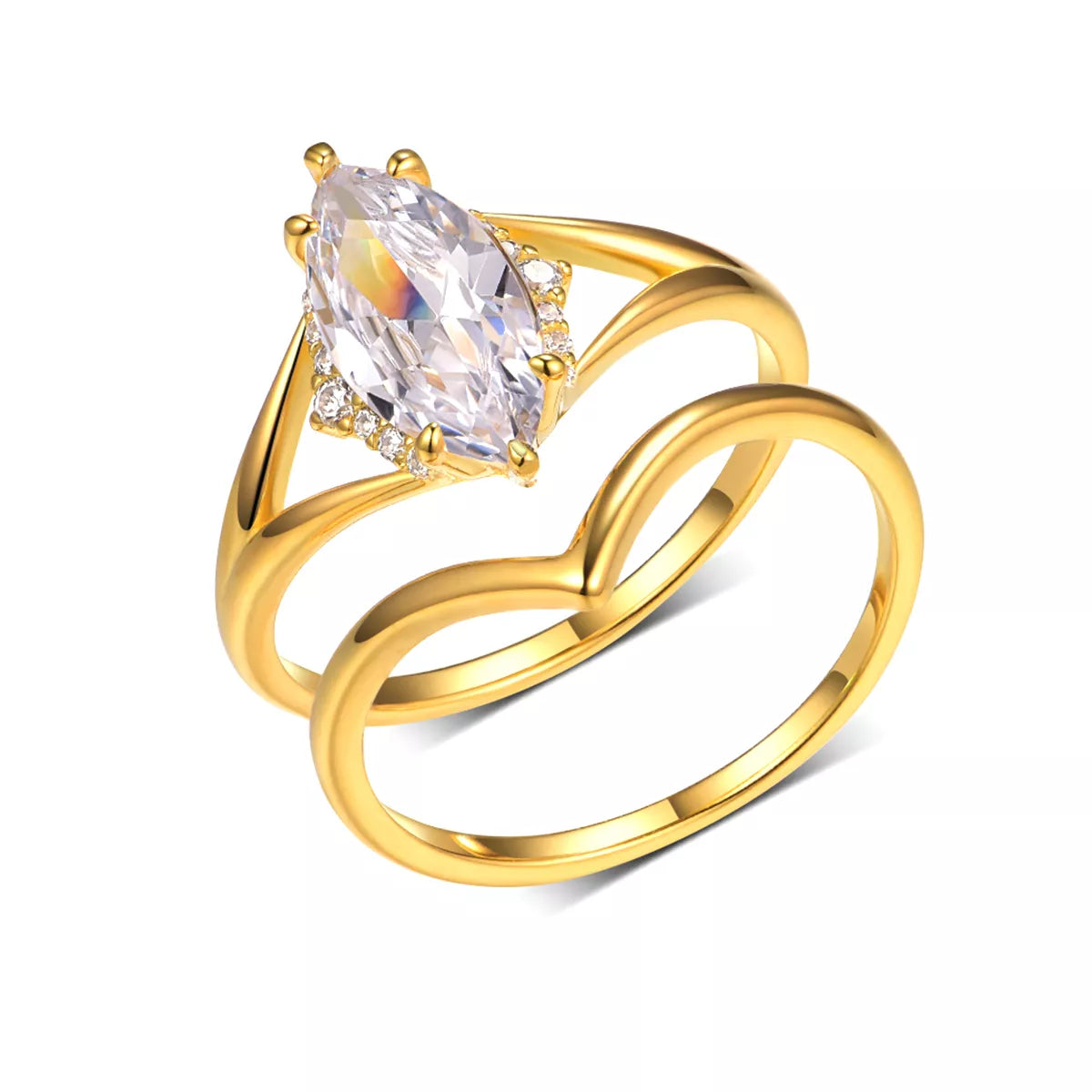 Gold two-piece marquise-cut moissanite ring set with a heart-shaped curved band displayed in a blush jewelry box.