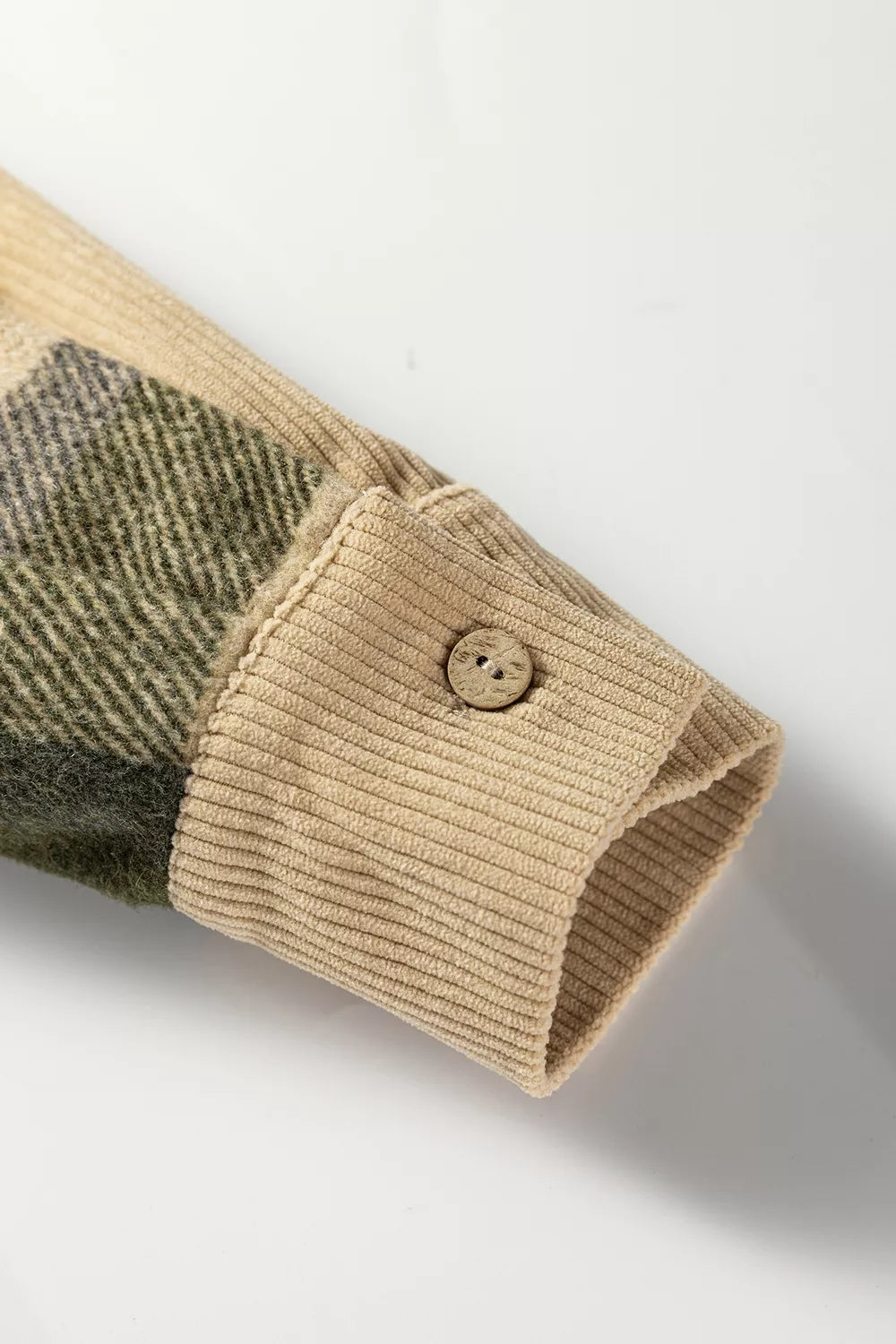 Plaid and corduroy button-front shacket with pockets, relaxed fit, normal thickness, and cozy earthy everyday styling.