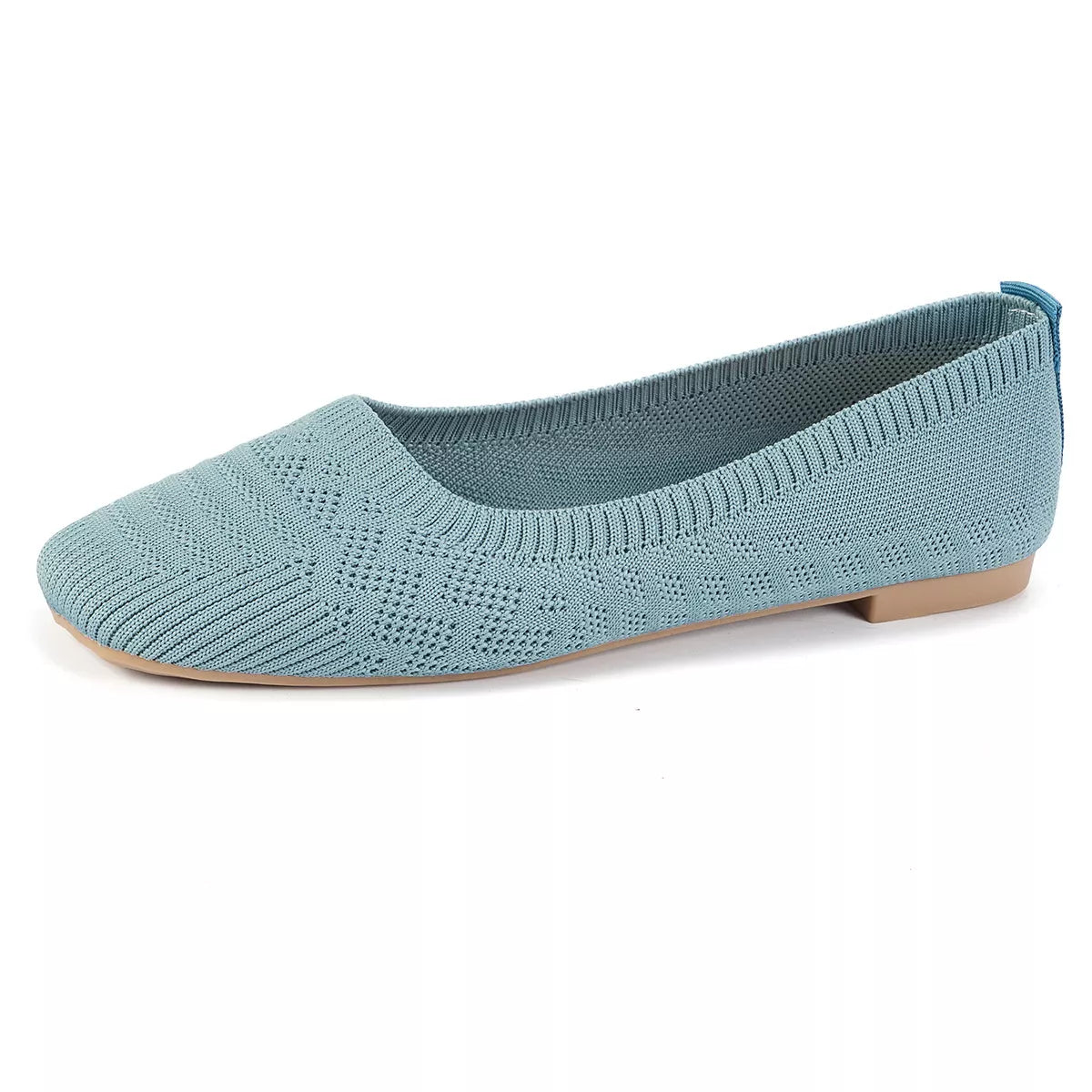 Close-up of sky blue knit square toe slip-on flats with low heel on wooden floor.