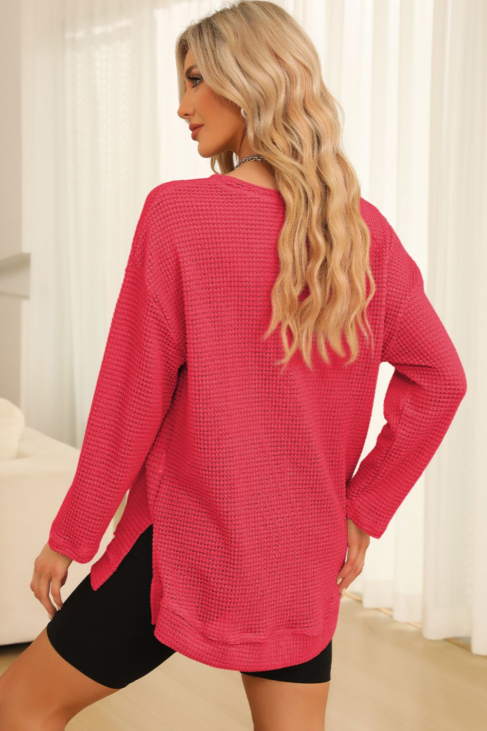 Everyday Ease waffle knit pullover with relaxed fit and side slit detail styled with denim shorts