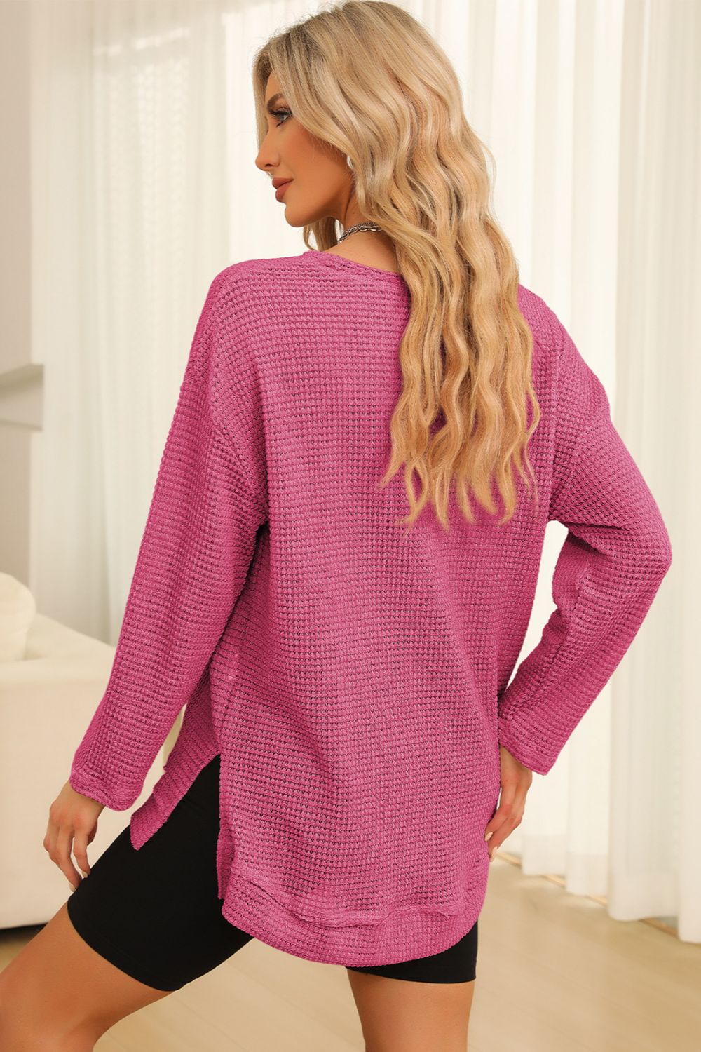 Everyday Ease waffle knit pullover with relaxed fit and side slit detail styled with denim shorts