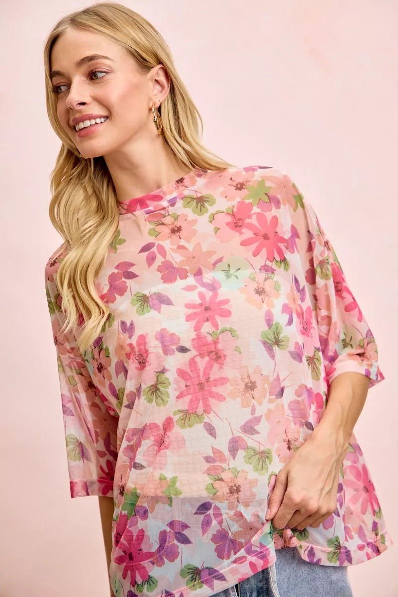 Pink floral sheer mesh short sleeve boxy top styled with light denim