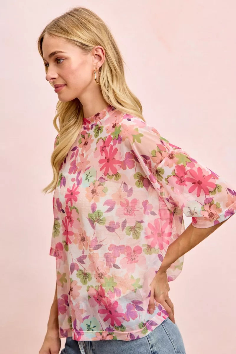 Pink floral sheer mesh short sleeve boxy top styled with light denim