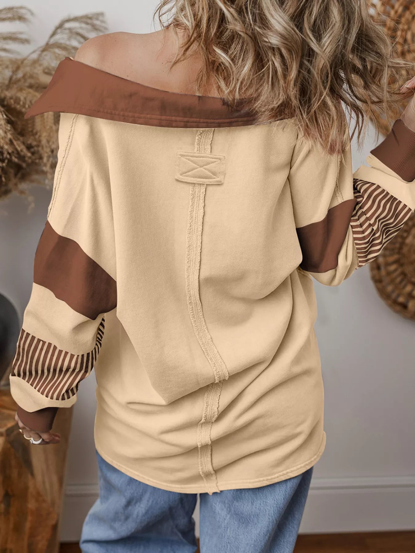 Game Day Sparkle Sweatshirt with sequin football graphics and color block polo design