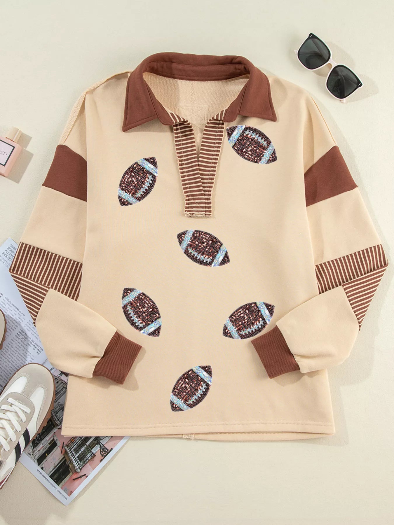 Game Day Sparkle Sweatshirt with sequin football graphics and color block polo design
