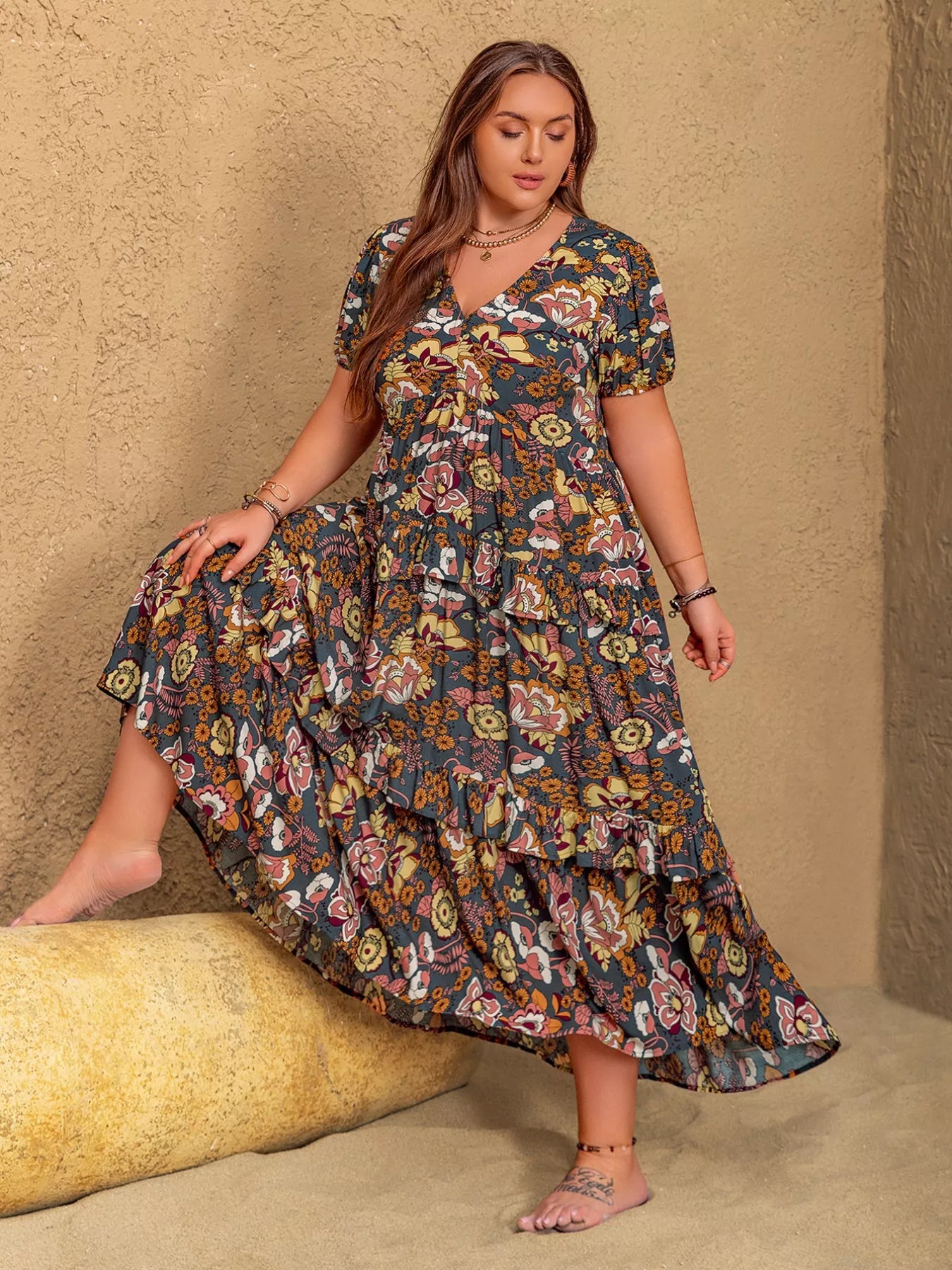 Plus size boho floral midi dress with short puff sleeves, ruffled tiers, and flowy fit