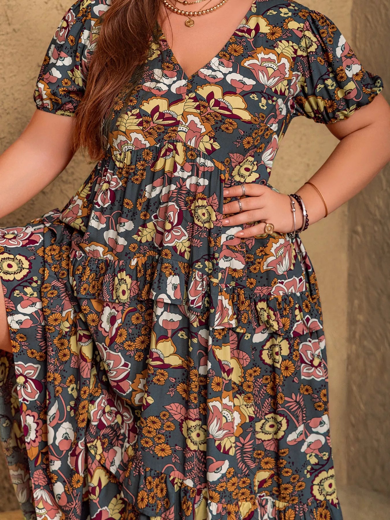 Plus size boho floral midi dress with short puff sleeves, ruffled tiers, and flowy fit
