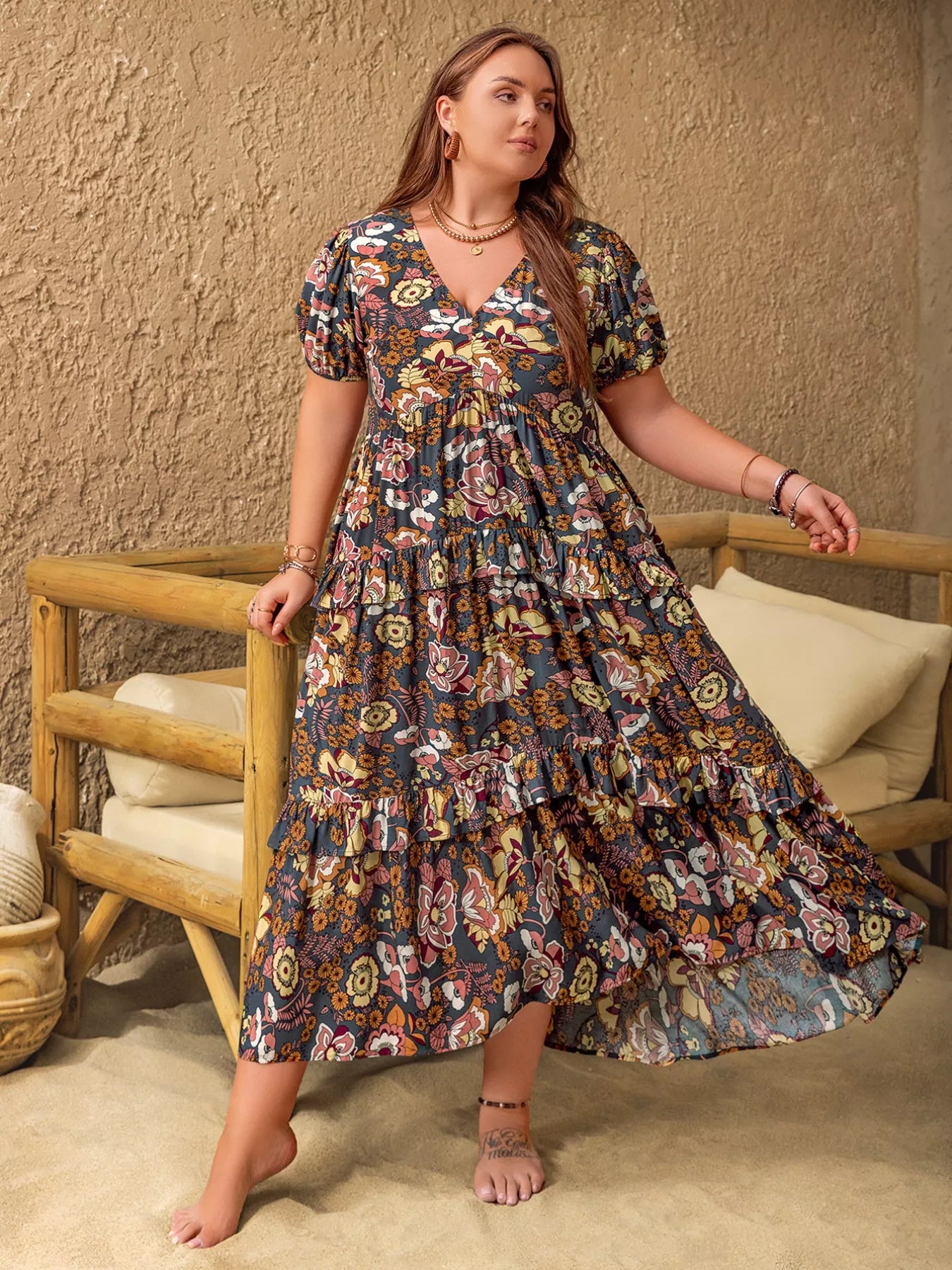 Plus size boho floral midi dress with short puff sleeves, ruffled tiers, and flowy fit