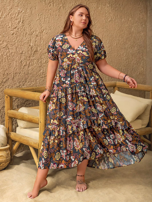 Plus size boho floral midi dress with short puff sleeves, ruffled tiers, and flowy fit