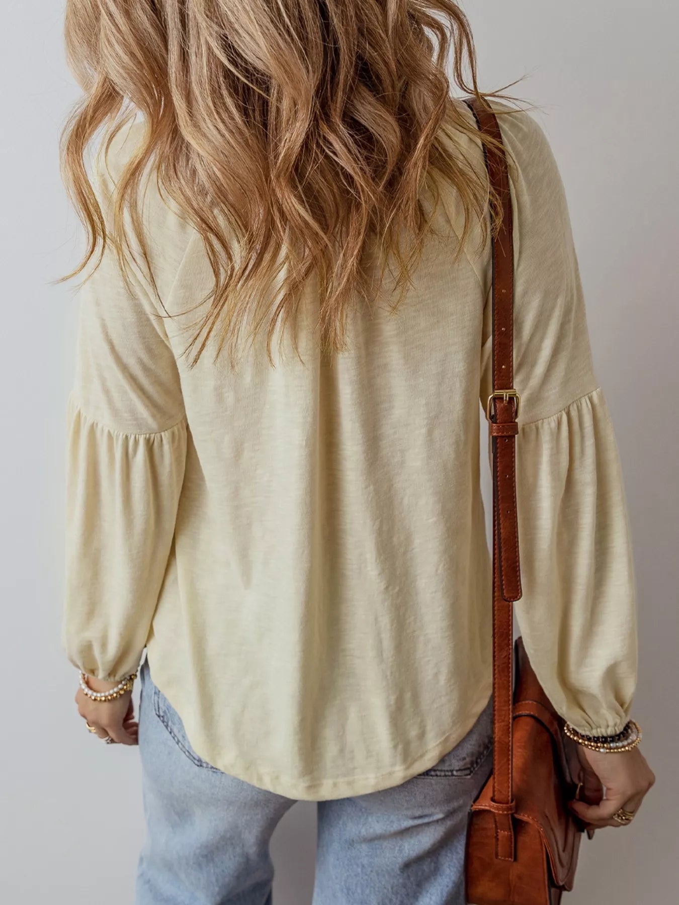 Cream boho peasant blouse with colorful floral embroidery and balloon sleeves