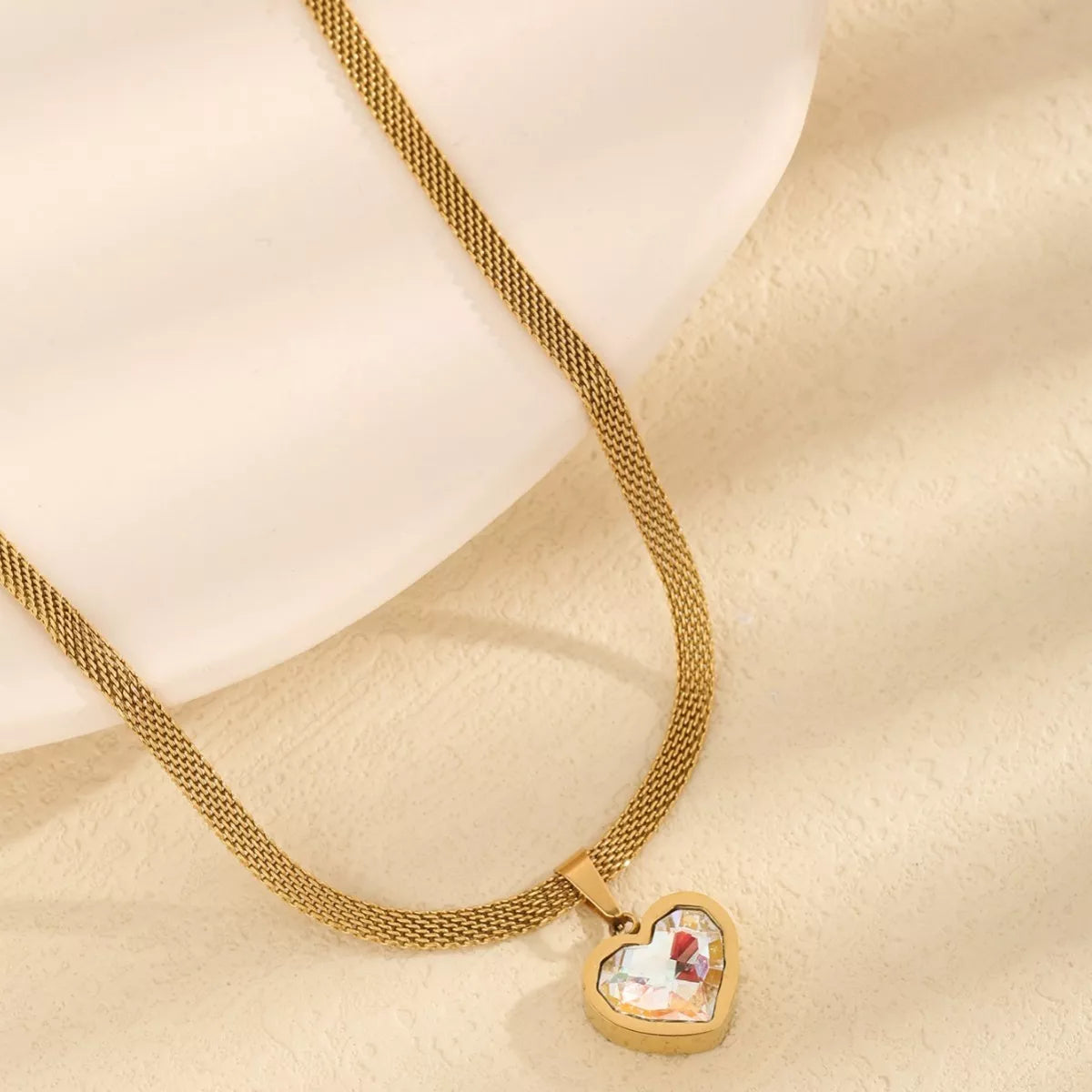 Gold heart pendant necklace with mesh chain
