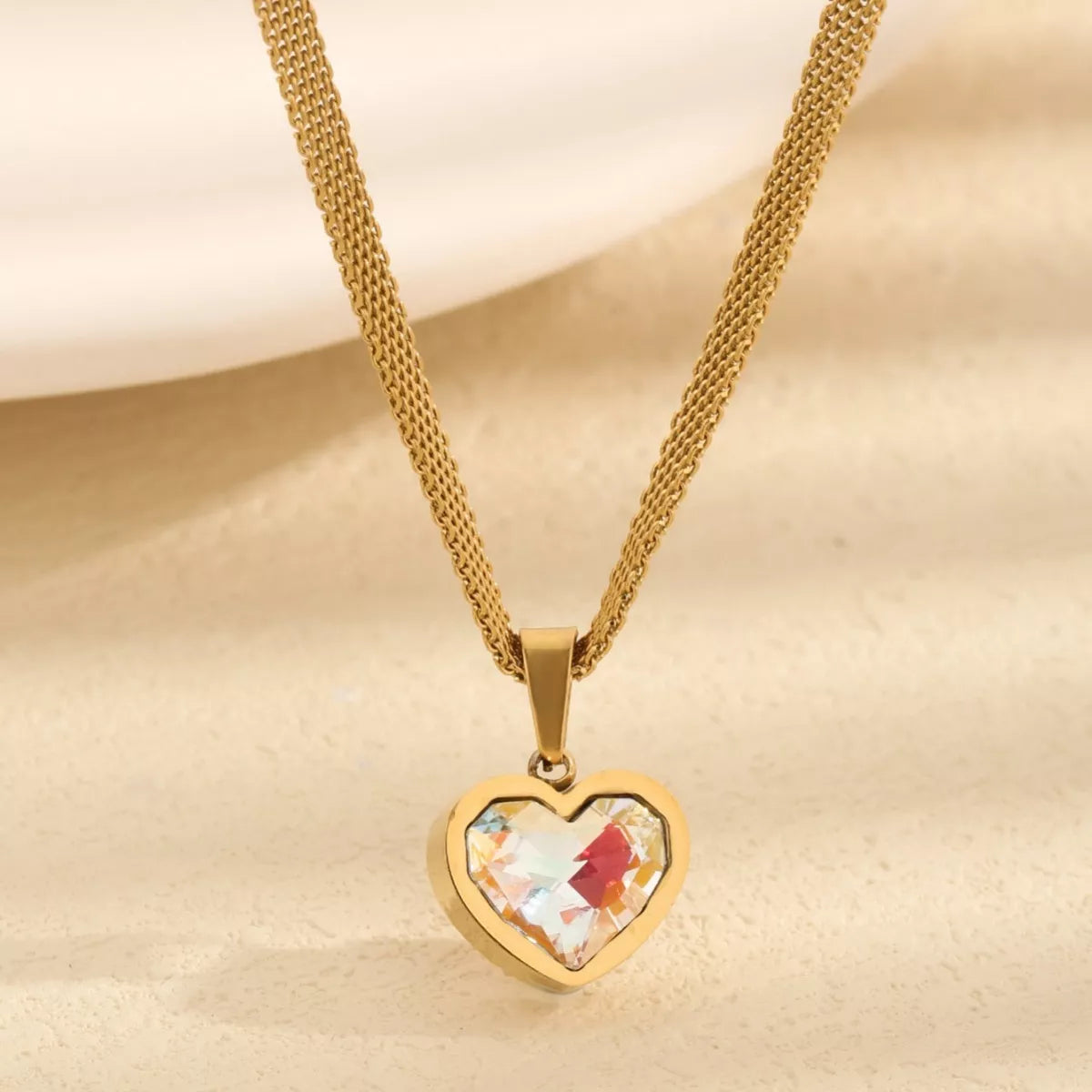 Gold heart pendant necklace with mesh chain