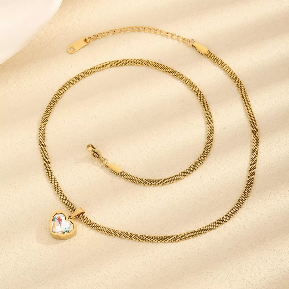 Gold heart pendant necklace with mesh chain