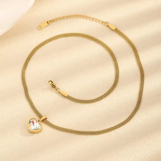 Gold heart pendant necklace with mesh chain