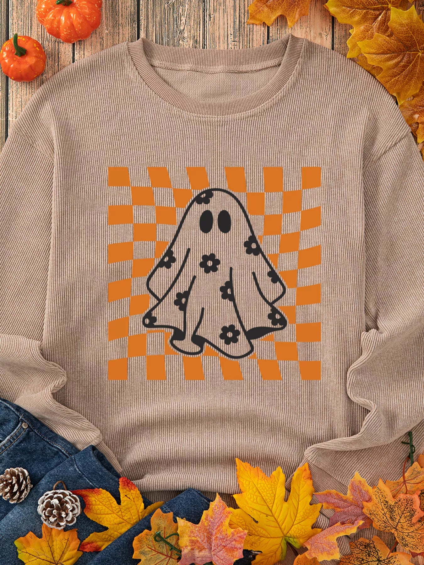 Oversized corded sweatshirt with ghost graphic on retro orange checkerboard with floral accents – Groovy Ghost style from A Whimsical Affair.