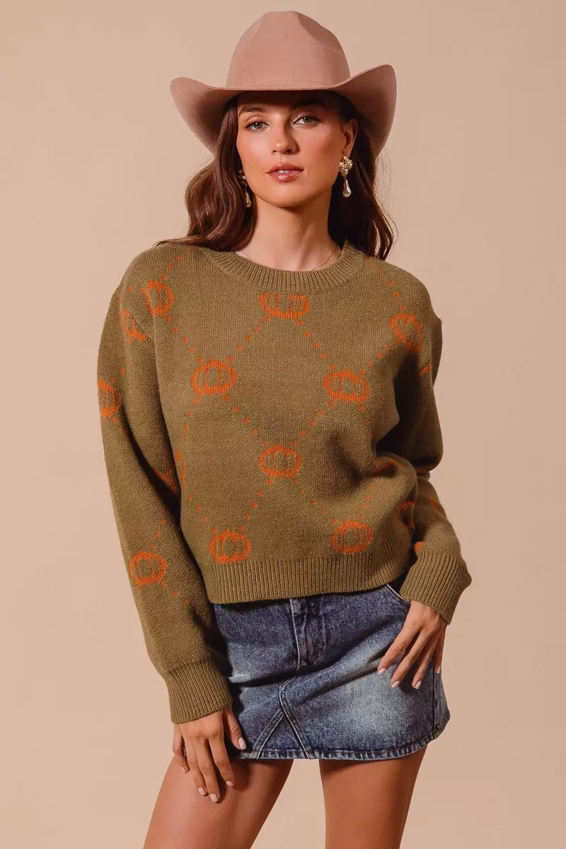 Harvest Hues Sweater – oversized knit with pumpkin rhombus pattern, cozy fall design for Halloween and Thanksgiving.