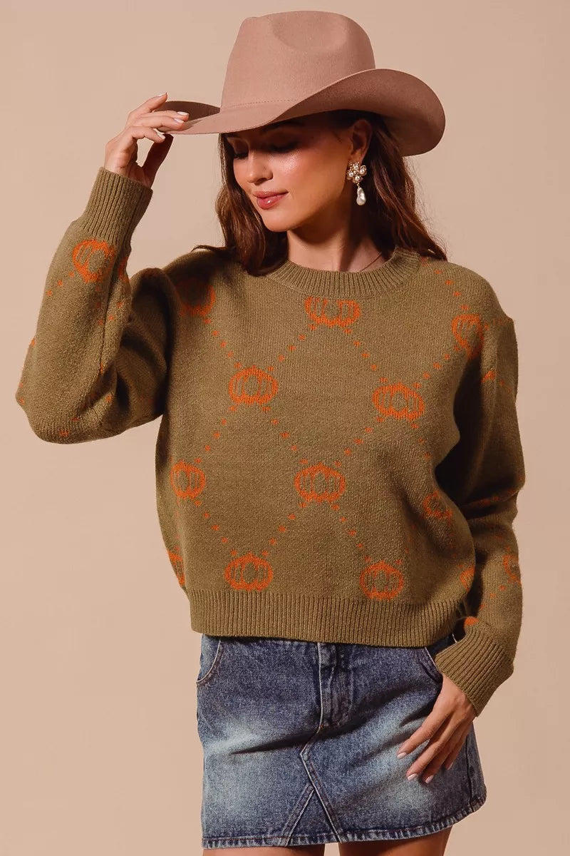 Harvest Hues Sweater – oversized knit with pumpkin rhombus pattern, cozy fall design for Halloween and Thanksgiving.
