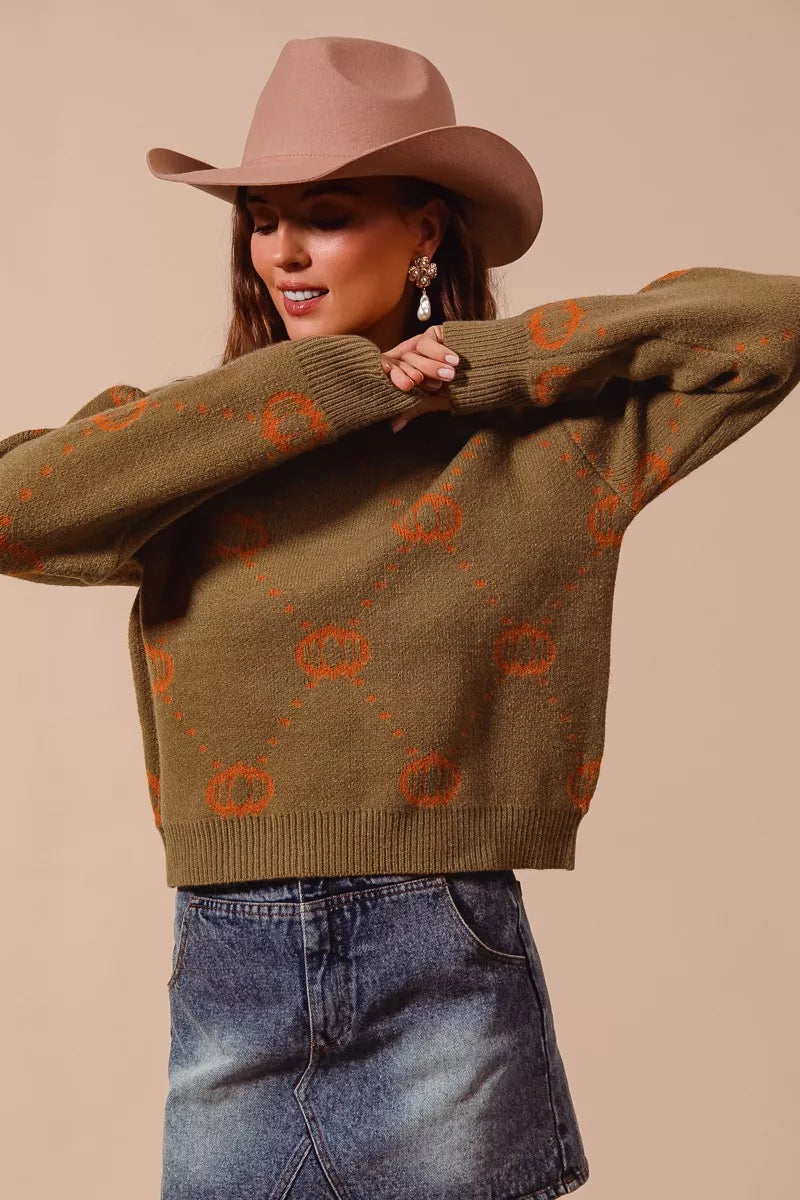 Harvest Hues Sweater – oversized knit with pumpkin rhombus pattern, cozy fall design for Halloween and Thanksgiving.
