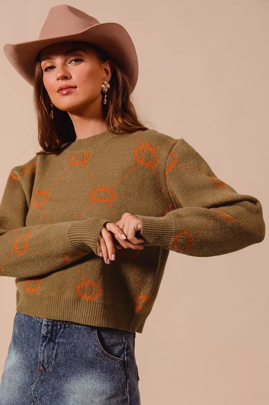 Harvest Hues Sweater – oversized knit with pumpkin rhombus pattern, cozy fall design for Halloween and Thanksgiving.