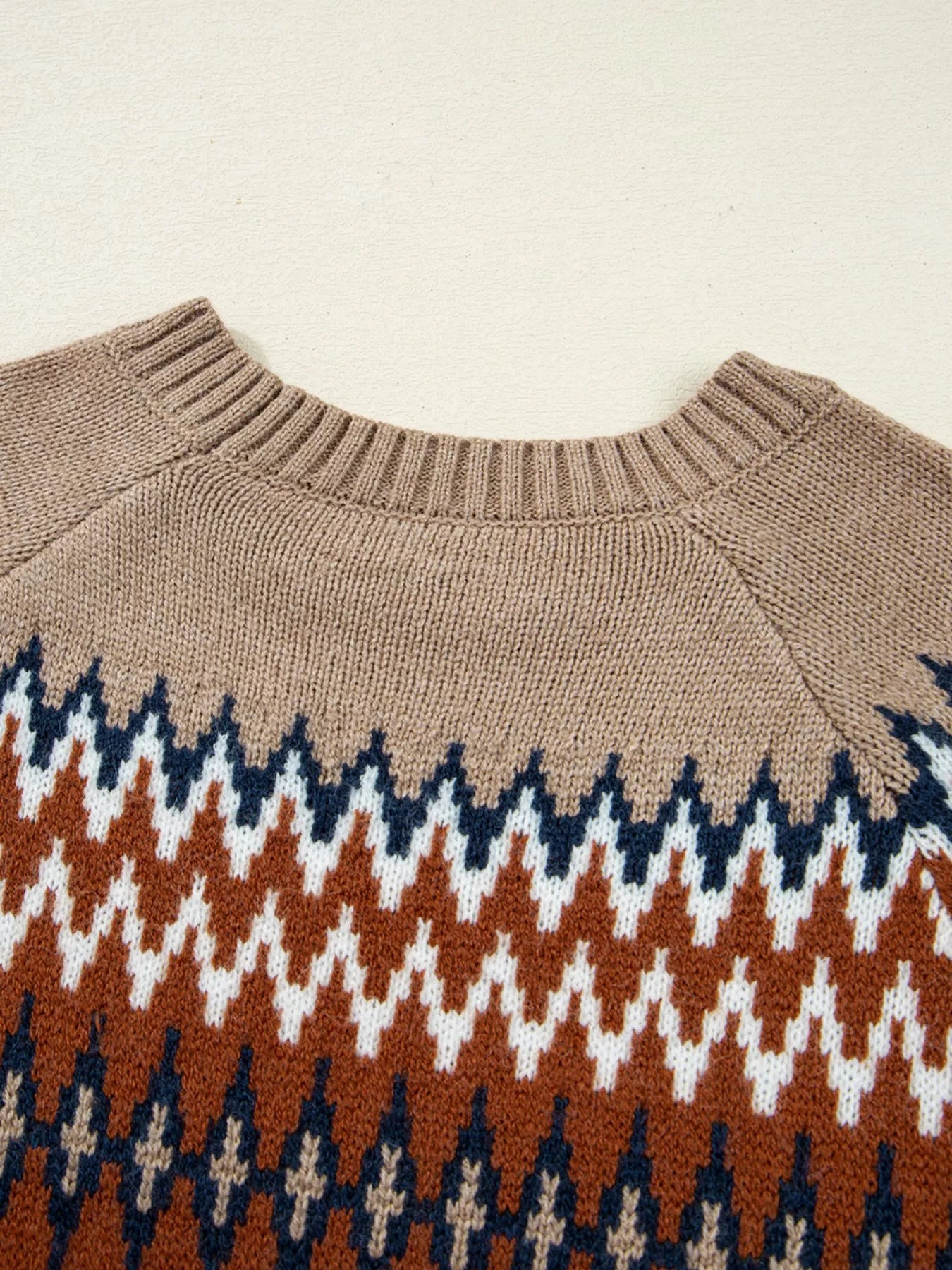 Fair Isle knit sweater with neutral geometric pattern