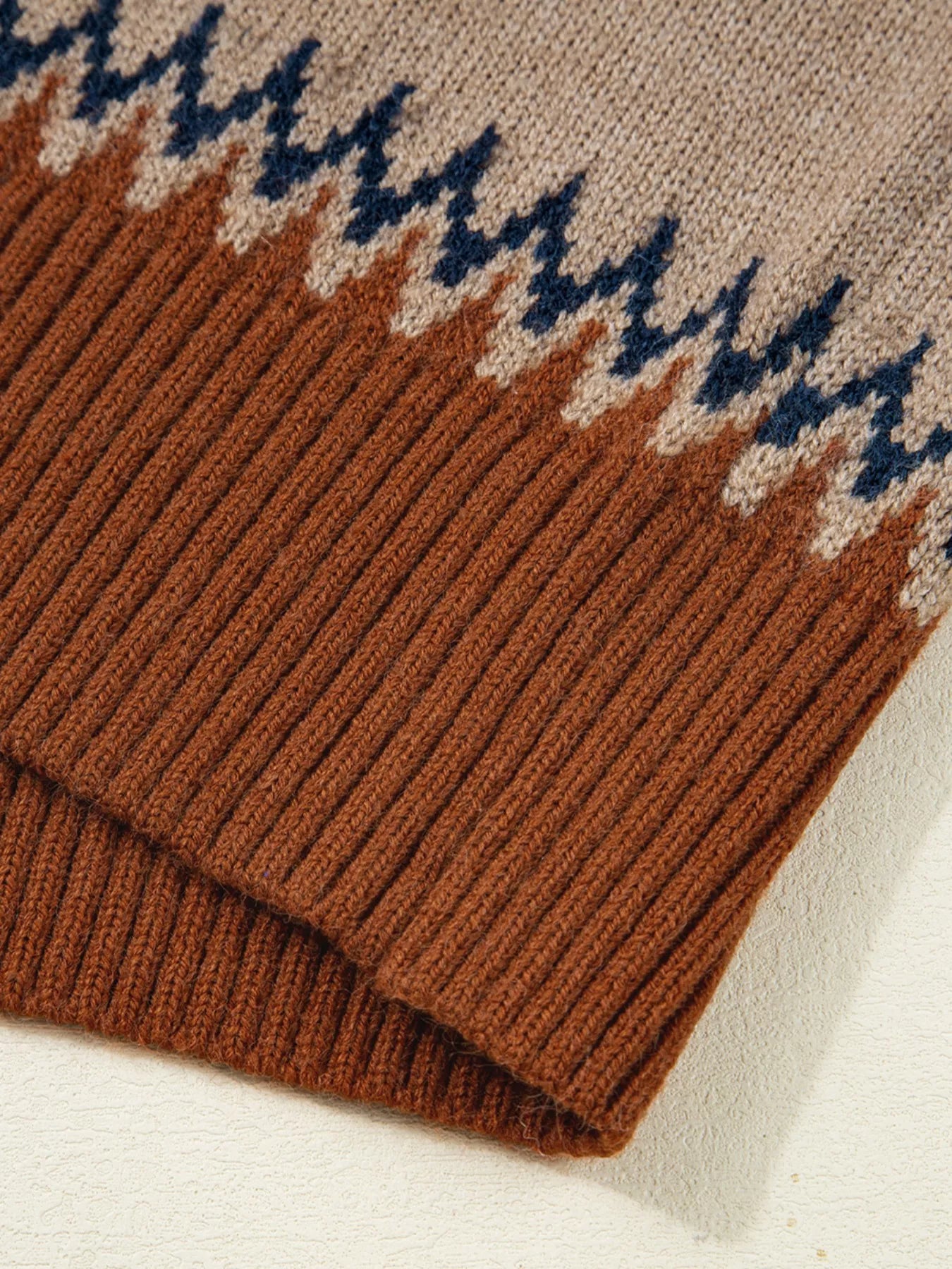 Fair Isle knit sweater with neutral geometric pattern