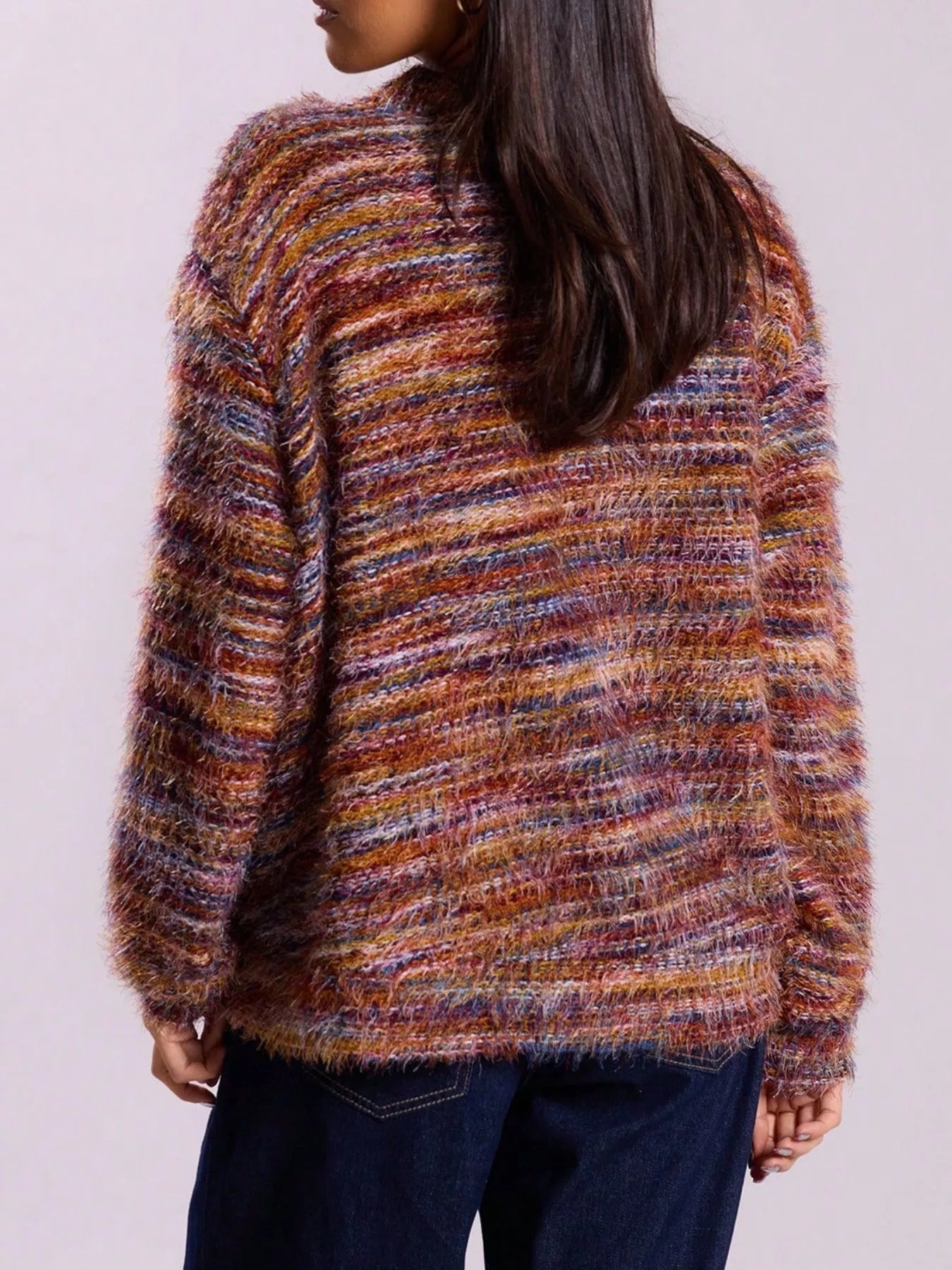Soft textured button-front cardigan with a fluffy, multicolored knit and relaxed fit.