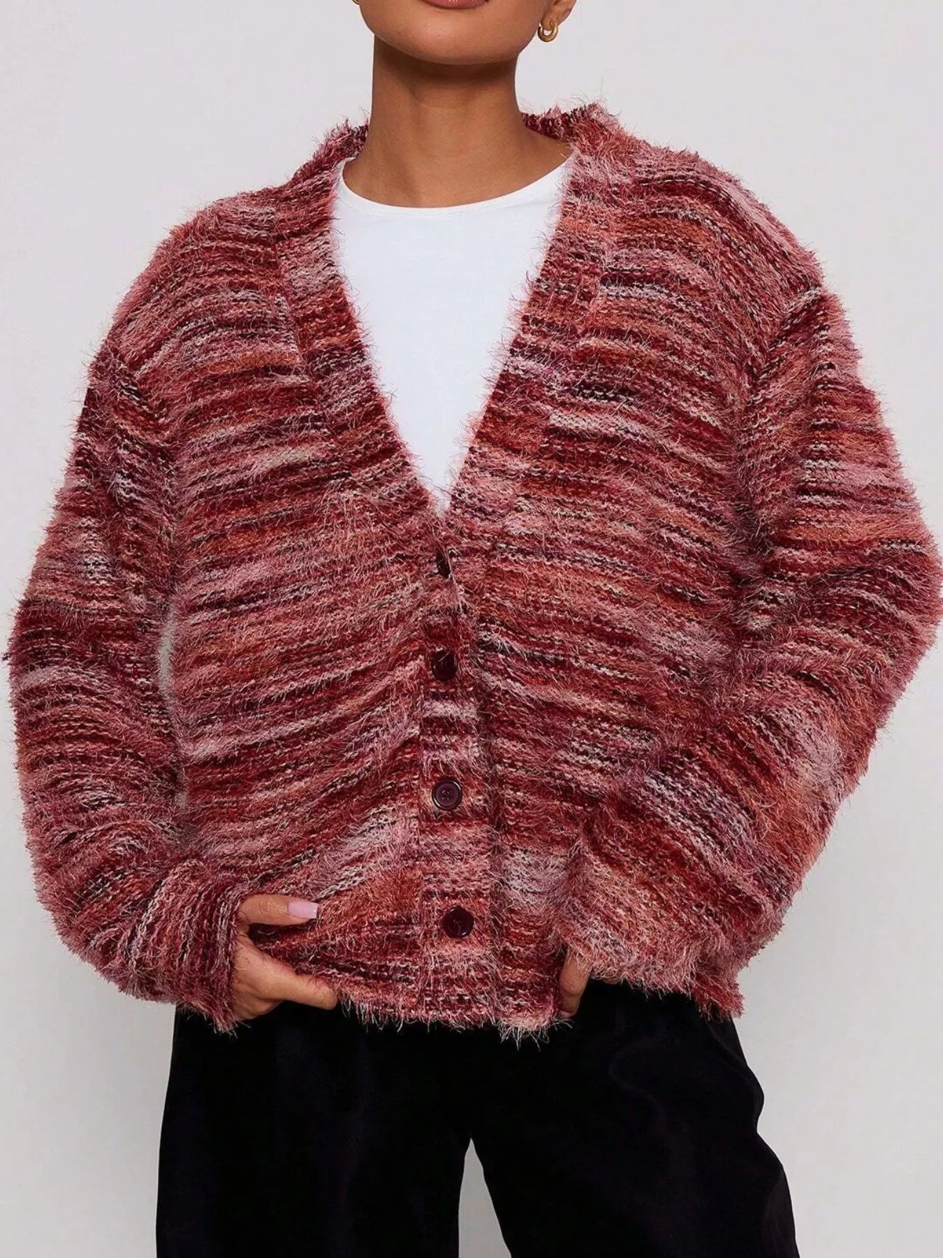 Soft textured button-front cardigan with a fluffy, multicolored knit and relaxed fit.