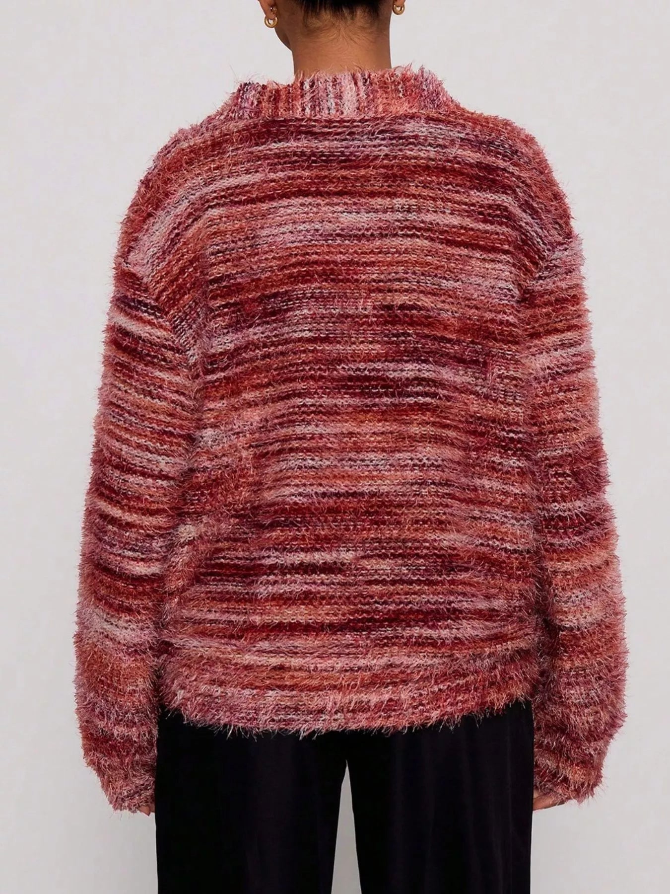 Soft textured button-front cardigan with a fluffy, multicolored knit and relaxed fit.