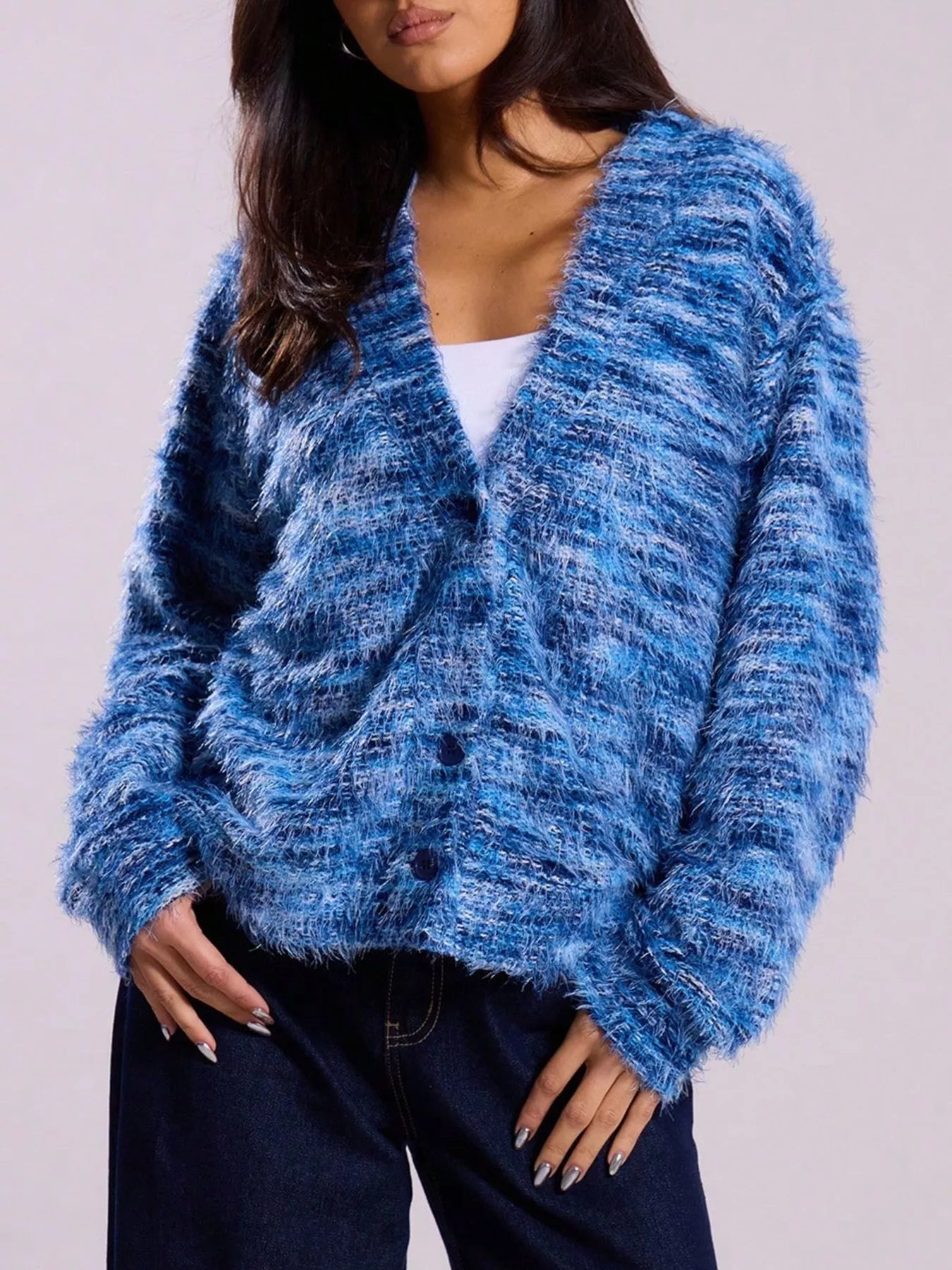 Soft textured button-front cardigan with a fluffy, multicolored knit and relaxed fit.
