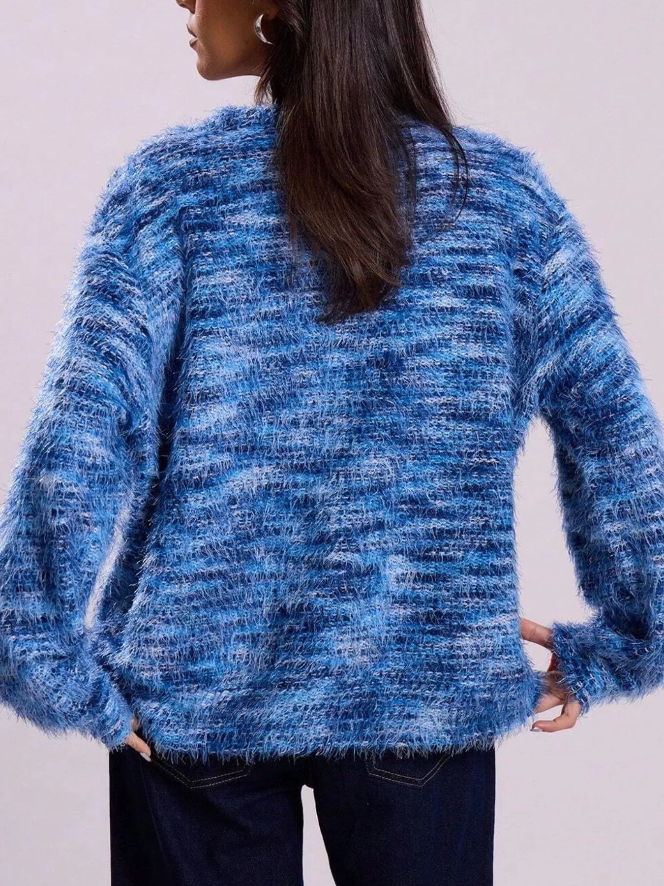Soft textured button-front cardigan with a fluffy, multicolored knit and relaxed fit.