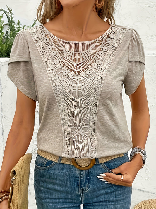 Light neutral top with ornate lace front panel and flutter sleeves
