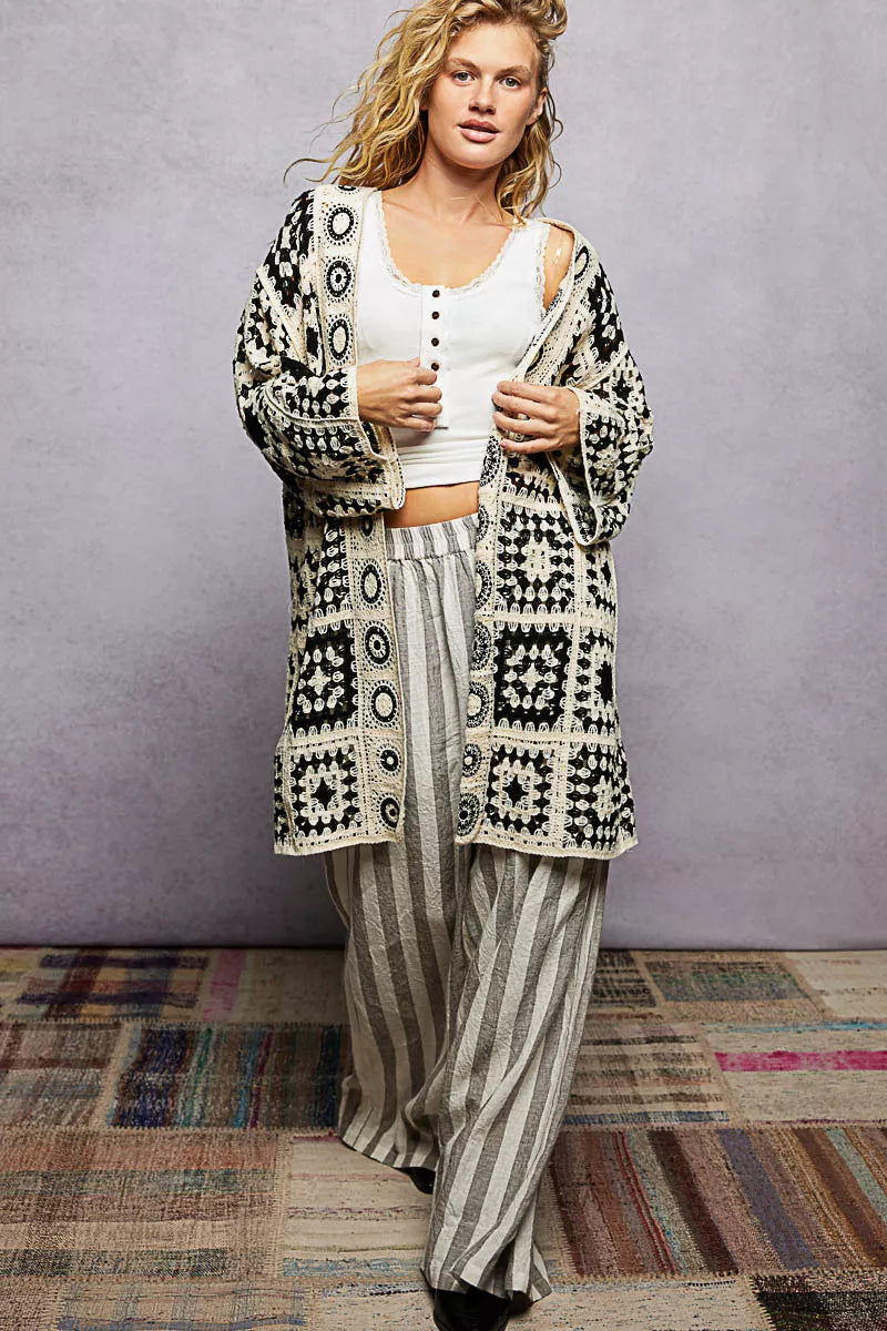 Relaxed fit black and cream crochet open cardigan with granny square pattern