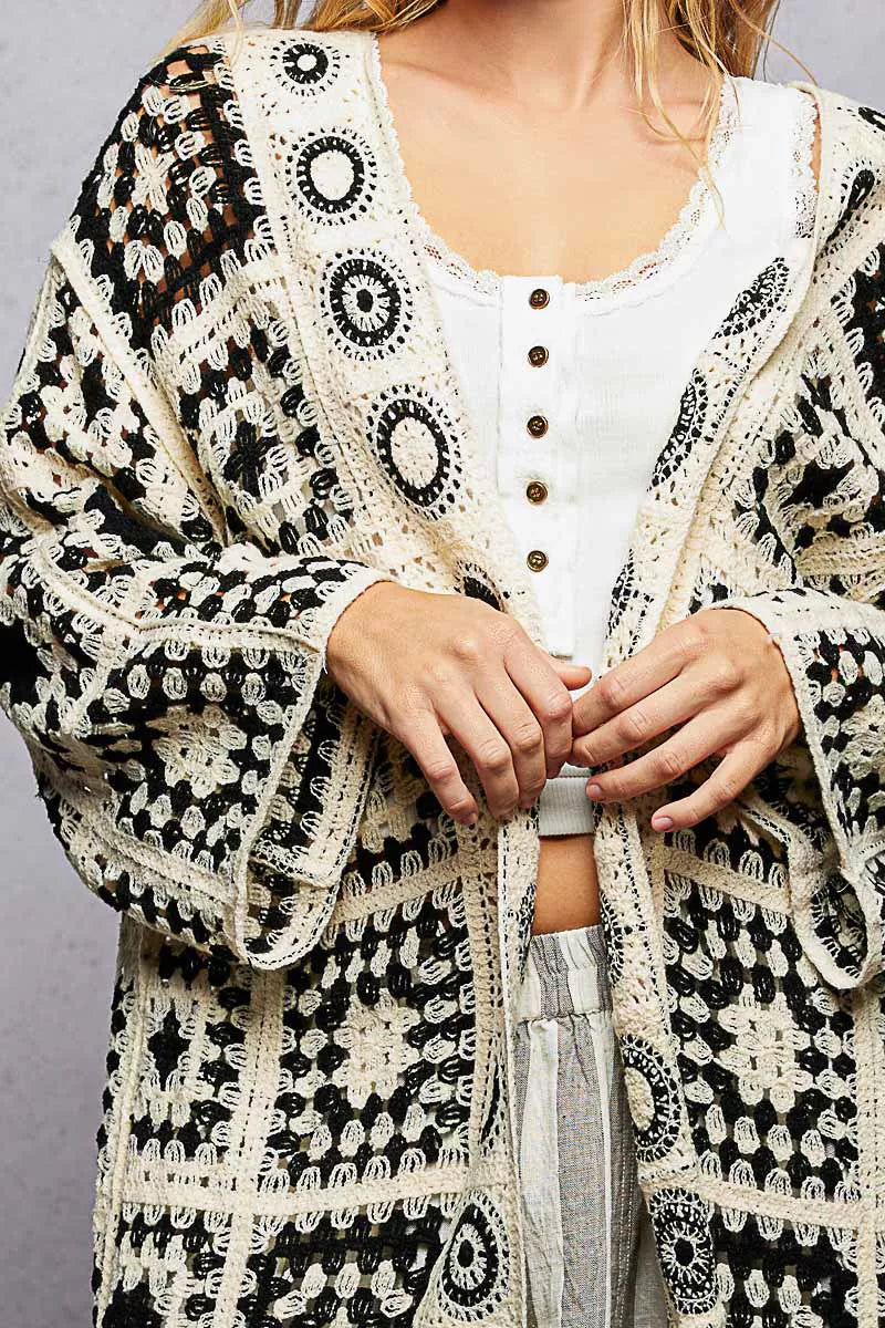 Relaxed fit black and cream crochet open cardigan with granny square pattern