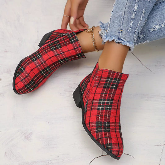 Vintage-inspired plaid ankle boots with a low heel styled with cropped denim