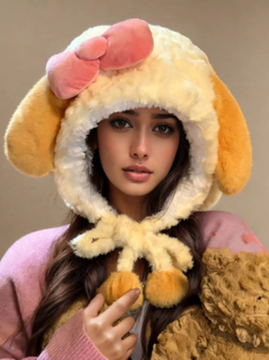 Soft plush earflap hood with floppy ears and pink velvet bow.