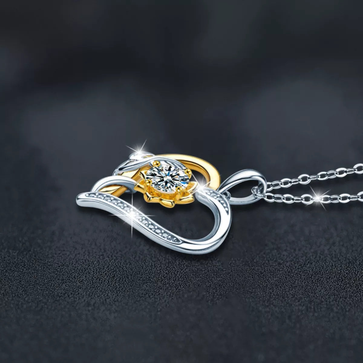 Intertwined heart pendant necklace with 1 carat moissanite in platinum-plated sterling silver