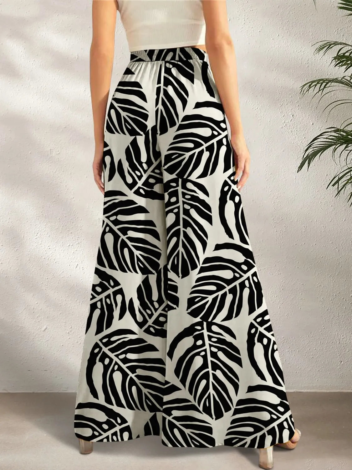 Black multi-colored boho printed wide-leg pants with pockets – Kaleidoscope style from A Whimsical Affair.