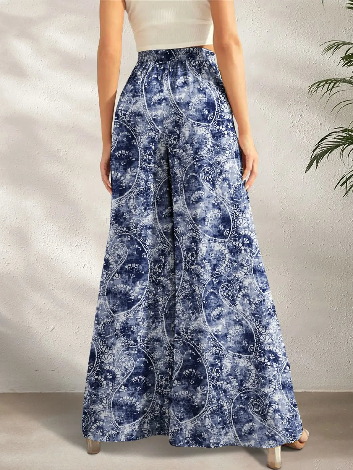 Dusty blue multi-colored boho printed wide-leg pants with pockets – Kaleidoscope style from A Whimsical Affair.