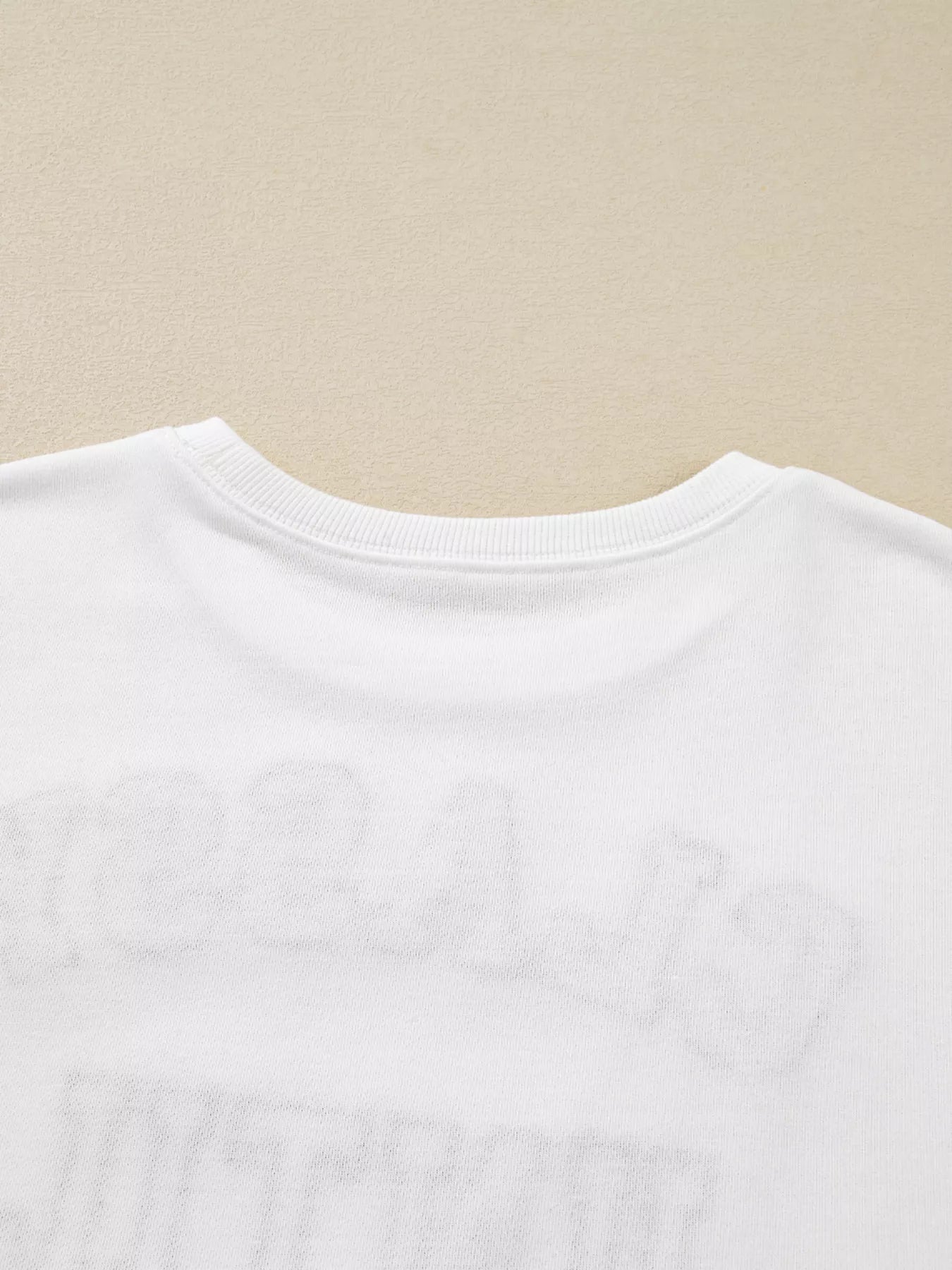 White Kickoff Queen sweatshirt with bold varsity lettering, cozy oversized fit, and casual sporty game day style.